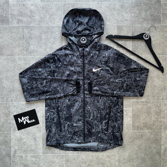 NIKE ‘EXCLUSIVE’ GLITCH WINDBREAKER - BLACK